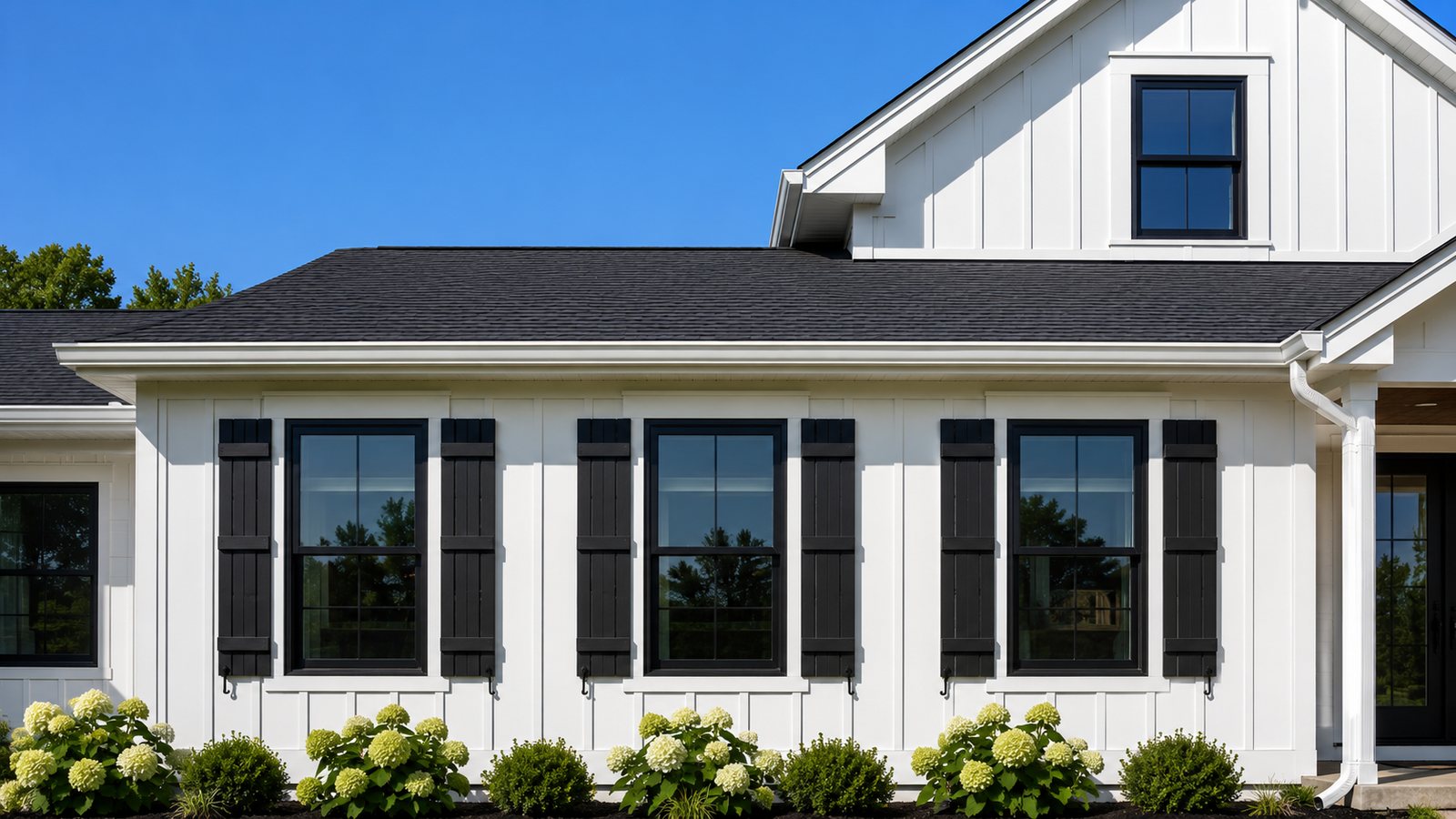 Black board-and-batten exterior shutters installed by BnR Home Solutions in North-Central Indiana